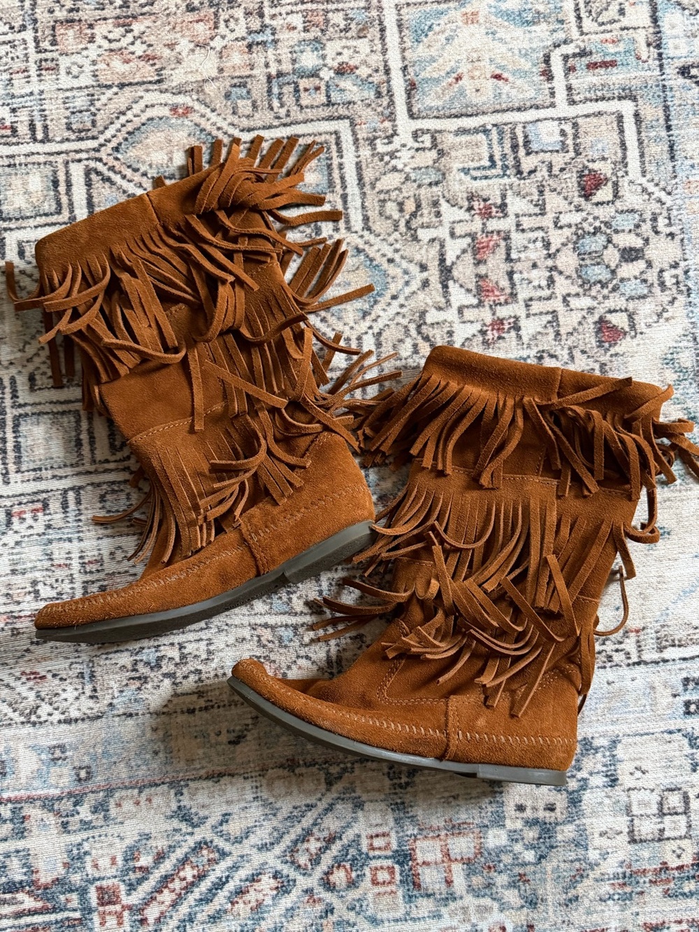 Minnetonka Fringe Suede Moccasin Boots in Cognac